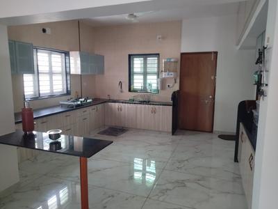 Kitchen Image of 4167 Sq.ft 4 BHK Villa for sale in Siddhi Aarohi Vihar, South Bopal Ahmedabad for Rs. 60000000