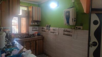 Kitchen Image of 900 Sq.ft 3 BHK Builder Floor for sale in Dwarka Mor New Delhi for Rs. 4300000
