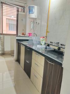 Kitchen Image of 963 Sq.ft 2 BHK Apartment / Flat for rent in Swagat Afford, Sargasan Gandhinagar for Rs. 24000