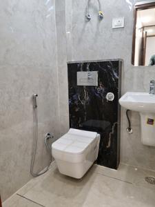 Common Bathroom Image of 600 Sq.ft 2 BHK Apartment / Flat for sale in Dwarka Mor New Delhi for Rs. 3800000