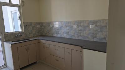 Kitchen Image of 1630 Sq.ft 3 BHK Apartment / Flat for sale in Assotech The Nest, Crossings Republik Ghaziabad for Rs. 12200000