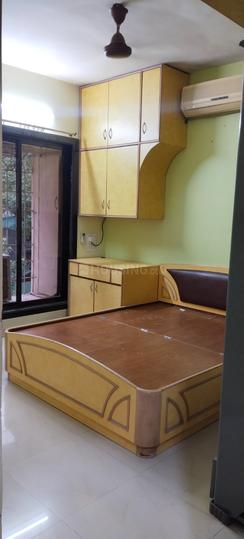 Moreshwar Dham Apartment Bedroom 1