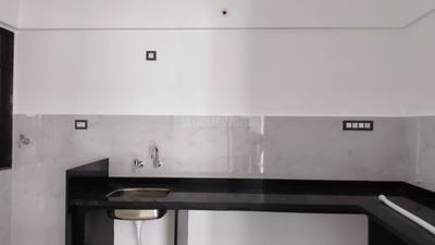 Kitchen Image of 945 Sq.ft 2 BHK Apartment / Flat for rent in Dudulgaon Pune for Rs. 19500
