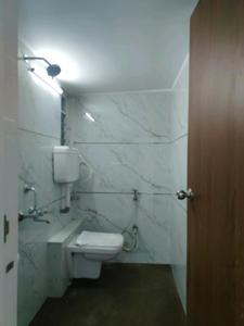 Common Bathroom Image of 610 Sq.ft 1 BHK Apartment / Flat for sale in Visharia Sadguru Tower Bldg No 2, Makane Kapase Mumbai for Rs. 2145000