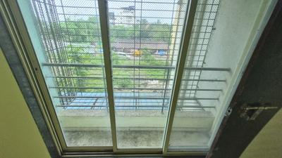 Balcony Image of 666 Sq.ft 1 BHK Apartment / Flat for sale in Laxmi Complex, Taloja Navi Mumbai for Rs. 3600000
