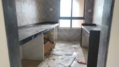 Kitchen Image of 710 Sq.ft 1 BHK Apartment / Flat for sale in Tharwani Millennium City, Badlapur East Badlapur for Rs. 2900000