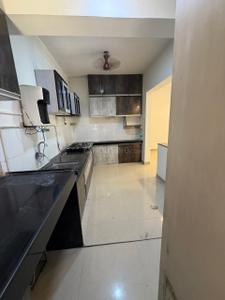 Kitchen Image of 950 Sq.ft 2 BHK Apartment / Flat for rent in Amit Colori, Undri Pune for Rs. 19000