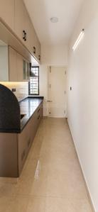 Kitchen Image of 750 Sq.ft 1 BHK Apartment / Flat for rent in Thanisandra Bengaluru for Rs. 23000