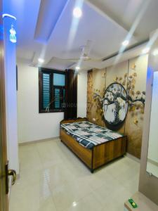 Bedroom Image of 1100 Sq.ft 3 BHK Builder Floor for rent in Dwarka Mor New Delhi for Rs. 18500