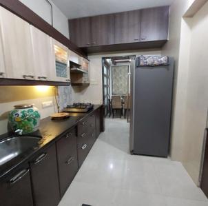 Kitchen Image of 920 Sq.ft 2 BHK Apartment / Flat for rent in Kasarvadavali Thane for Rs. 29000
