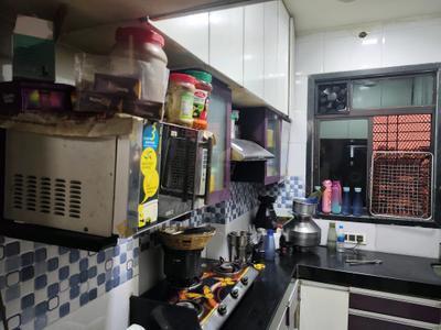 Kitchen Image of 950 Sq.ft 2 BHK Apartment / Flat for rent in Puraniks Home Town E , Kasarvadavali Thane for Rs. 19562