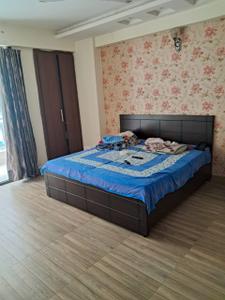 Bedroom Image of 1220 Sq.ft 2 BHK Apartment / Flat for sale in Mahagun Mascot, Crossings Republik Ghaziabad for Rs. 8000000