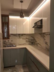 Kitchen Image of 650 Sq.ft 2 BHK Builder Floor for sale in Happy Homes, Dwarka Mor New Delhi for Rs. 3400000