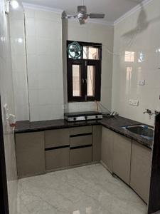 Kitchen Image of 1076 Sq.ft 4 BHK Apartment / Flat for sale in Mukundpur New Delhi for Rs. 5500000