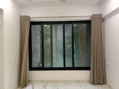 Living Room Image of 656 Sq.ft 1 BHK Apartment / Flat for sale in MICL Aaradhya Parkwood, Mira Road East Mira Bhayandar for Rs. 9135000