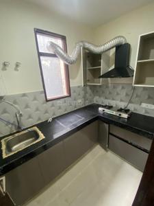 Kitchen Image of 1500 Sq.ft 1 BHK Builder Floor for rent in Sector 56 Gurgaon for Rs. 29000