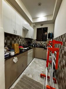 Kitchen Image of 1300 Sq.ft 2 BHK Builder Floor for rent in Sector 43 Gurgaon for Rs. 46000