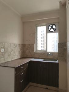 Kitchen Image of 945 Sq.ft 2.5 BHK Apartment / Flat for sale in NBCC Golf Homes, Noida Extension Greater Noida for Rs. 7001000