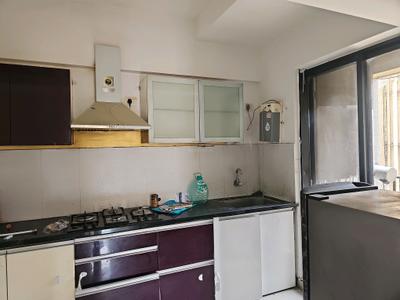 Kitchen Image of 800 Sq.ft 1.5 BHK Apartment / Flat for rent in Long Island, Charholi Budruk Pune for Rs. 25000