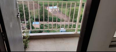 Balcony Image of 650 Sq.ft 1 BHK Apartment / Flat for sale in Sarthak Optima Heights, Wagholi Pune for Rs. 2750000