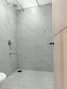 Common Bathroom Image of 950 Sq.ft 2 BHK Apartment / Flat for sale in M Square Ramalay, Dhankawadi Pune for Rs. 12500000