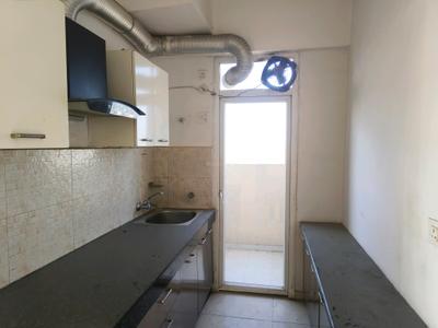 Kitchen Image of 700 Sq.ft 2 BHK Apartment / Flat for sale in Signature Global The Millennia, Sector 37D Gurgaon for Rs. 7000000