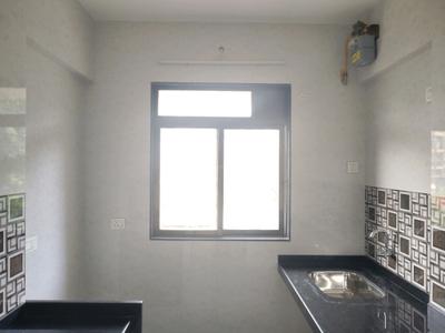 Kitchen Image of 700 Sq.ft 1 BHK Apartment / Flat for rent in Puraniks City Reserva Phase 1, Kasarvadavali Thane for Rs. 16001