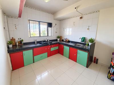 Kitchen Image of 874 Sq.ft 2 BHK Apartment / Flat for rent in Tyagi Durvankur Society, Kharadi Pune for Rs. 30000