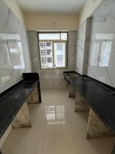Kitchen Image of 960 Sq.ft 2 BHK Apartment / Flat for sale in Mohan Willows III, Badlapur East Badlapur for Rs. 4050000