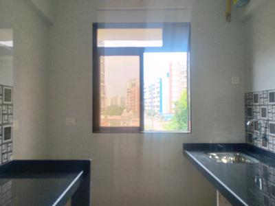 Kitchen Image of 697 Sq.ft 1 BHK Apartment / Flat for sale in Palm Vista A1 &amp; A2, Shilphata Thane for Rs. 5499000