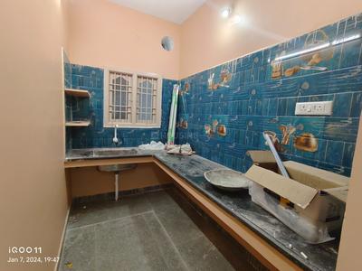 Kitchen Image of 650 Sq.ft 1 BHK Independent House for rent in Tiruvottiyur Chennai for Rs. 11500
