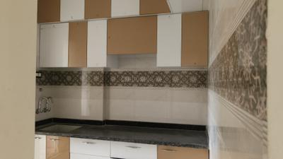 Kitchen Image of 835 Sq.ft 2 BHK Apartment / Flat for sale in Satyam Sheela, Badlapur East Badlapur for Rs. 3200000