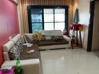 Living Room Image of 1050 Sq.ft 2 BHK Apartment / Flat for rent in Bhoomi Shubh Shagun Complex, Kamothe Navi Mumbai for Rs. 24000