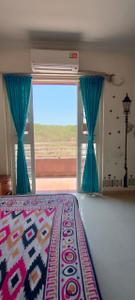 Bedroom Image of 766 Sq.ft 2 BHK Apartment / Flat for sale in Dudulgaon Pune for Rs. 4800000