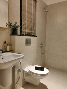 Common Bathroom Image of 700 Sq.ft 2 BHK Apartment / Flat for sale in Rustomjee La Familia, Thane West Thane for Rs. 13600000