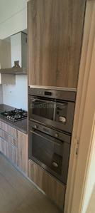 Kitchen Image of 1600 Sq.ft 3 BHK Apartment / Flat for sale in DLF The Primus, Sector 82A Gurgaon for Rs. 28500000