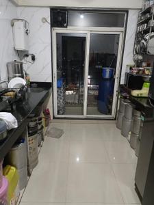 Kitchen Image of 950 Sq.ft 2 BHK Apartment / Flat for sale in Gajra Bhoomi Lawns, Shilphata Thane for Rs. 6100000