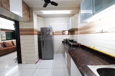 Kitchen Image of 936 Sq.ft 2 BHK Apartment / Flat for sale in Sarjan Tower, Memnagar Ahmedabad for Rs. 7700000