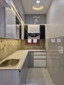 Kitchen Image of 600 Sq.ft 2 BHK Apartment / Flat for sale in Dwarka Mor New Delhi for Rs. 4200000