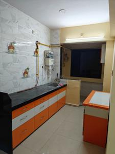 Kitchen Image of 1060 Sq.ft 1 BHK Apartment / Flat for rent in Pramukh Yogi Milan, Yogi Vihar Silvassa for Rs. 9500