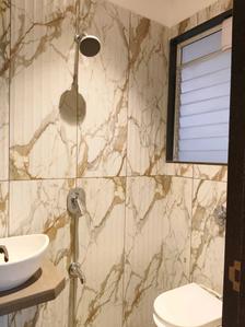 Common Bathroom Image of 1179 Sq.ft 1 BHK Apartment / Flat for sale in Swaminarayan Sky Marina, Dombivli East Thane for Rs. 7200000