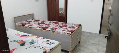 Bedroom Image of GIRLS PG WITH ATTACHED BATHROOM in Sector 18, Noida