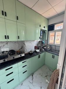 Kitchen Image of 952 Sq.ft 1 BHK Builder Floor for rent in Palam Vihar Gurgaon for Rs. 32000