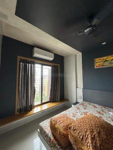 Bedroom Image of 790 Sq.ft 2 BHK Apartment / Flat for rent in Puraniks Kanchan Pushp Society, Kasarvadavali Thane for Rs. 30000