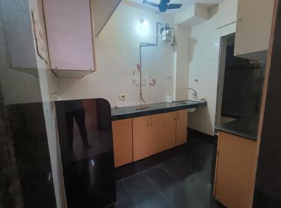 Kitchen Image of 1050 Sq.ft 3 BHK Apartment / Flat for rent in Kopar Khairane Navi Mumbai for Rs. 45000