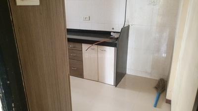 Kitchen Image of 750 Sq.ft 2 BHK Apartment / Flat for sale in Gemstar Symphony, Kandivali West Mumbai for Rs. 17500000