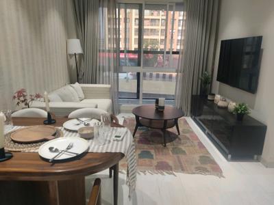 Living Room Image of 1090 Sq.ft 2 BHK Apartment / Flat for sale in Origin Wisteria Square, Mira Road East Mira Bhayandar for Rs. 9300000