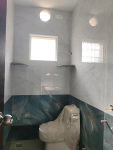 Common Bathroom Image of 975 Sq.ft 2 BHK Apartment / Flat for sale in Green Karpaka Viruksham, Kovilambakkam Chennai for Rs. 7980000