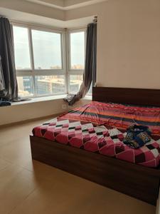 Bedroom Image of 1100 Sq.ft 2 BHK Apartment / Flat for rent in Bhartiya Nikoo Homes Phase 2, Thanisandra Bengaluru for Rs. 43000