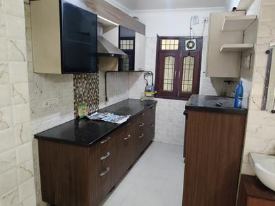 Kitchen Image of 1200 Sq.ft 2 BHK Apartment / Flat for rent in Pink Apartments, Sector 18 Dwarka New Delhi for Rs. 39000